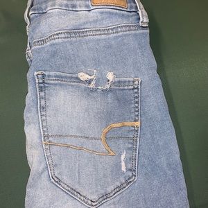 Light was ripped jeans